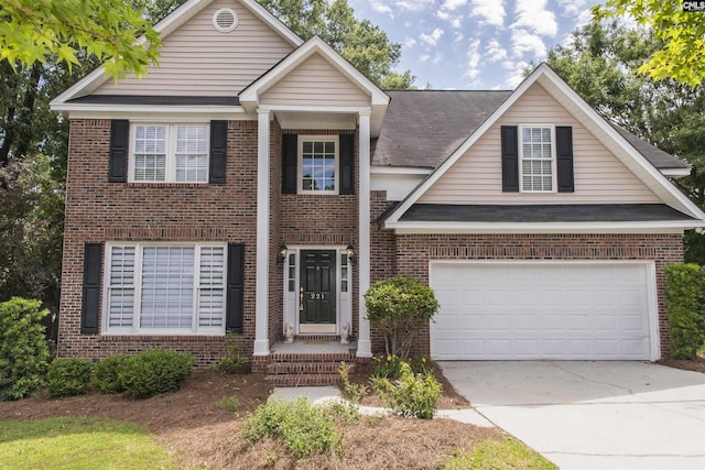 221 Sandstone Rd, Columbia, SC 29212 - view of front of house with brick siding, concrete driveway, a garage, and a shingled roof