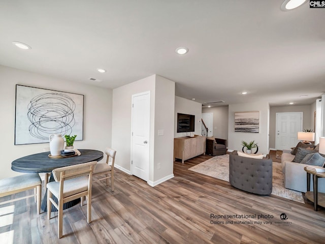 219 Bones Rd, Gilbert, SC 29054 - dining room with wood finished floors, baseboards, and recessed lighting