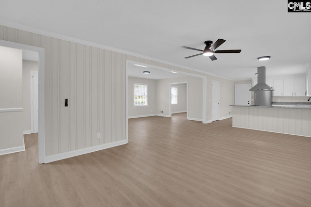 248 Shareditch Rd, Columbia, SC 29210 - unfurnished living room with ornamental molding, light wood-style flooring, ceiling fan, and baseboards
