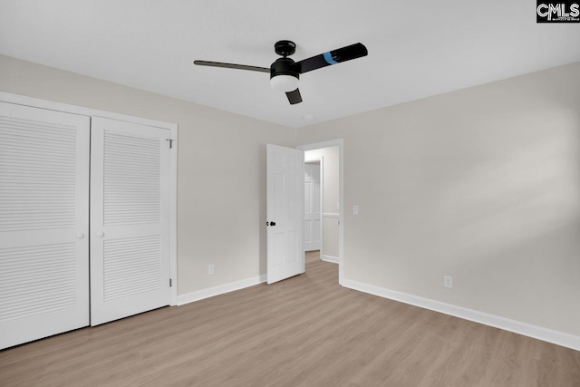 248 Shareditch Rd, Columbia, SC 29210 - unfurnished bedroom featuring light wood-style flooring, baseboards, a closet, and ceiling fan