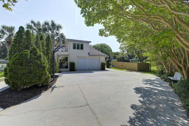 520 Sail Point Way, Columbia, SC 29212 - traditional-style house with driveway, a balcony, stucco siding, and an attached garage