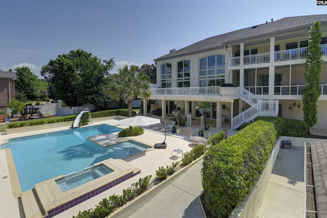 520 Sail Point Way, Columbia, SC 29212 - view of swimming pool with a patio area, a water slide, a pool with connected hot tub, and stairway