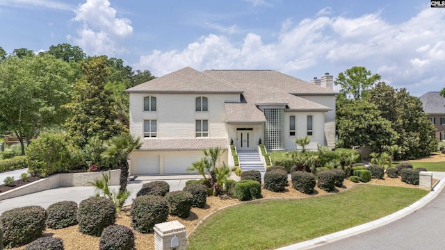 520 Sail Point Way, Columbia, SC 29212 - view of front facade featuring a garage, concrete driveway, a chimney, a front yard, and a shingled roof