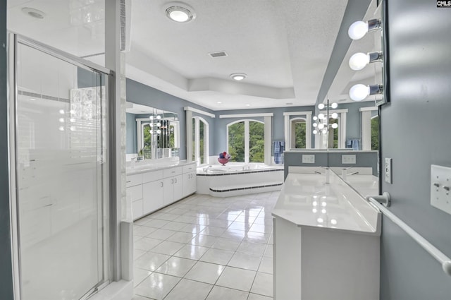 520 Sail Point Way, Columbia, SC 29212 - full bath with a chandelier, a bath, a raised ceiling, vanity, and a textured ceiling