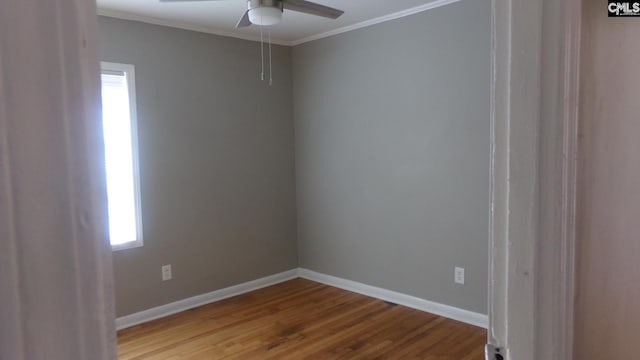3208 Downes Grove Rd, Columbia, SC 29209 - unfurnished room featuring wood finished floors, a ceiling fan, baseboards, and crown molding