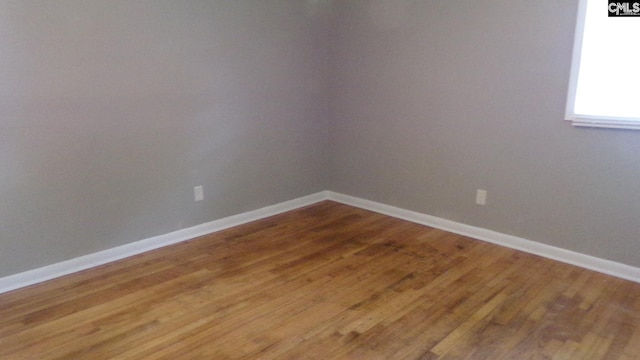 3208 Downes Grove Rd, Columbia, SC 29209 - empty room featuring baseboards and wood finished floors