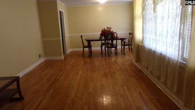 3208 Downes Grove Rd, Columbia, SC 29209 - dining space featuring wood finished floors, ornamental molding, and baseboards