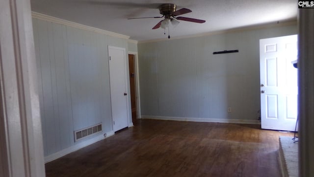 3208 Downes Grove Rd, Columbia, SC 29209 - unfurnished room featuring dark wood finished floors, ceiling fan, ornamental molding, and baseboards