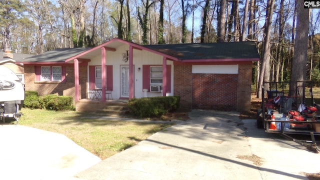 3208 Downes Grove Rd, Columbia, SC 29209 - ranch-style home featuring brick siding, cooling unit, and driveway
