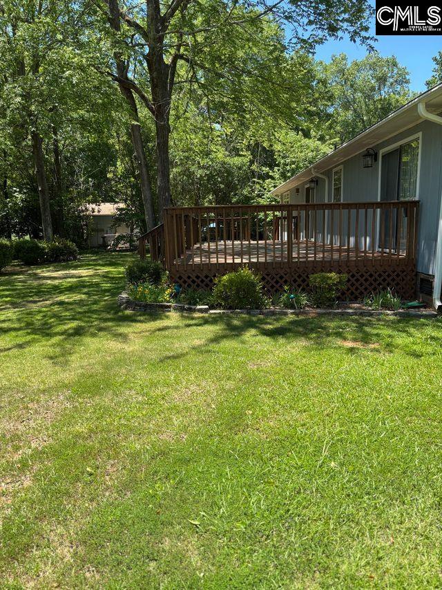100 Clee Hill Ct, Irmo, SC 29063 - view of green lawn featuring a wooden deck