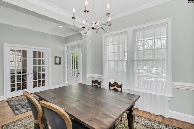 128 Van Der Horst Dr, Columbia, SC 29229 - dining room with a chandelier, ornamental molding, wood finished floors, french doors, and baseboards