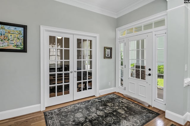 128 Van Der Horst Dr, Columbia, SC 29229 - entryway featuring french doors, crown molding, baseboards, and wood finished floors