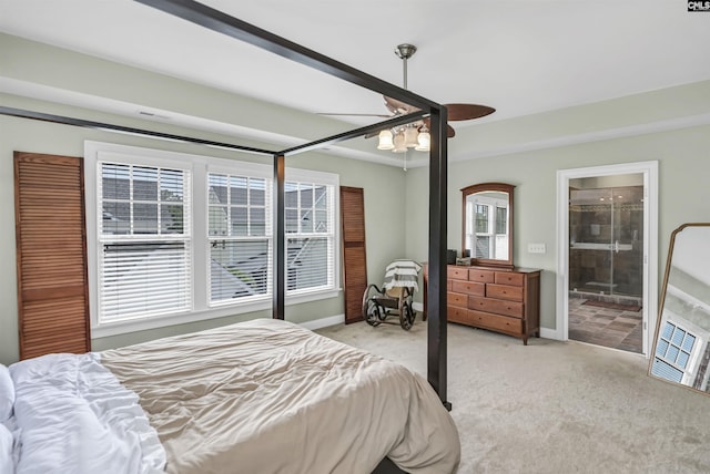 128 Van Der Horst Dr, Columbia, SC 29229 - bedroom with light carpet, baseboards, connected bathroom, and a ceiling fan