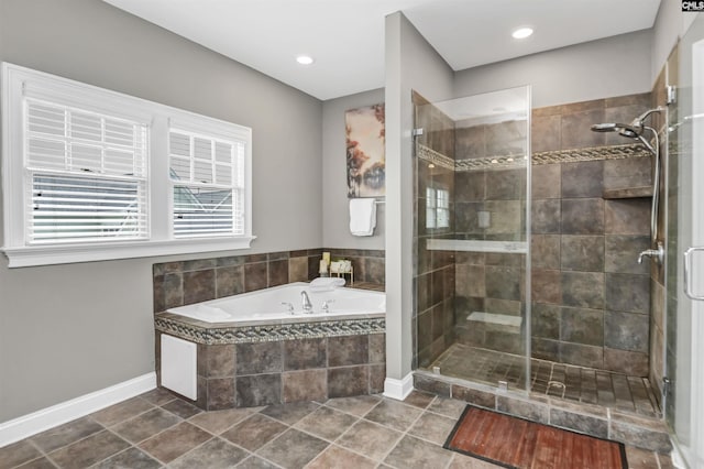 128 Van Der Horst Dr, Columbia, SC 29229 - full bath with a garden tub, a stall shower, plenty of natural light, and recessed lighting