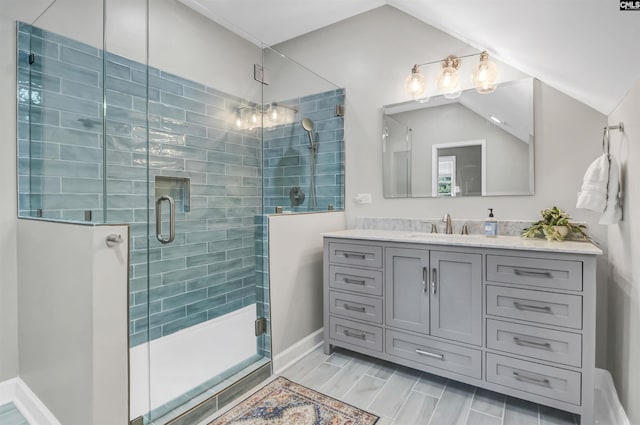 128 Van Der Horst Dr, Columbia, SC 29229 - bathroom featuring vanity, a shower stall, baseboards, and vaulted ceiling