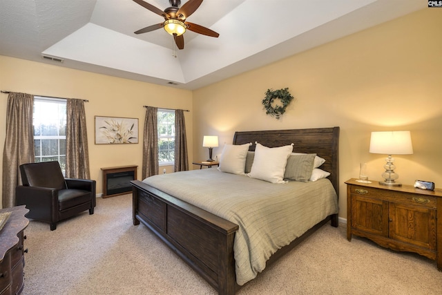 301 Spring Mist Ct, Lexington, SC 29072 - bedroom with light carpet, a tray ceiling, a ceiling fan, and baseboards