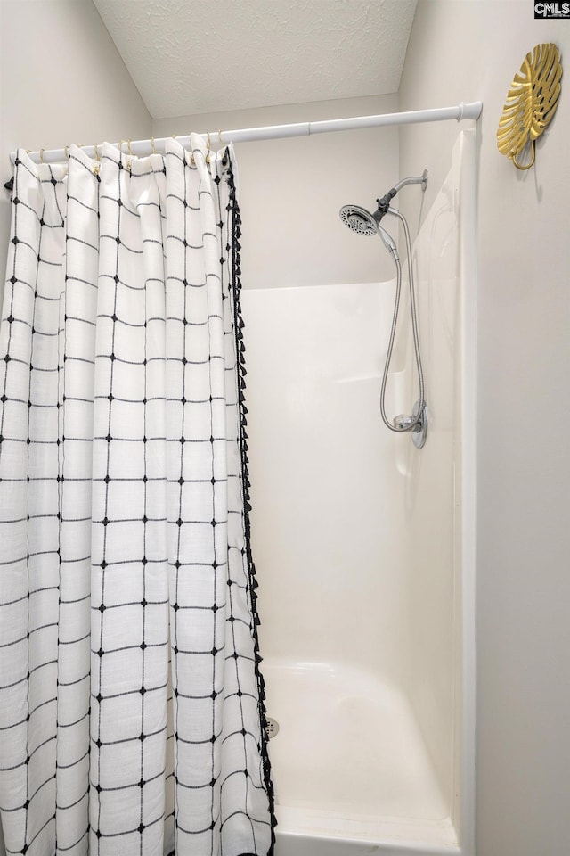 301 Spring Mist Ct, Lexington, SC 29072 - bathroom with a shower with curtain and a textured ceiling