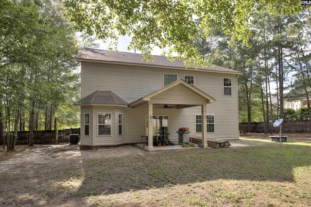 22 Genesis Ln, Camden, SC 29020 - back of property with ceiling fan, a fenced backyard, a patio area, and central AC