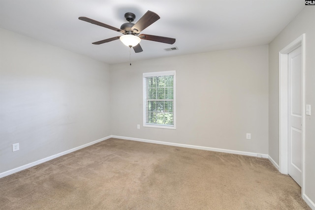 22 Genesis Ln, Camden, SC 29020 - unfurnished room with light colored carpet, a ceiling fan, and baseboards
