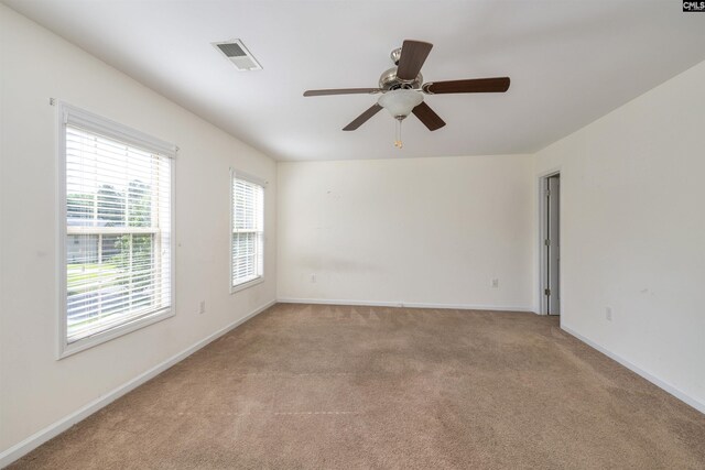 22 Genesis Ln, Camden, SC 29020 - spare room with light colored carpet, baseboards, and a ceiling fan