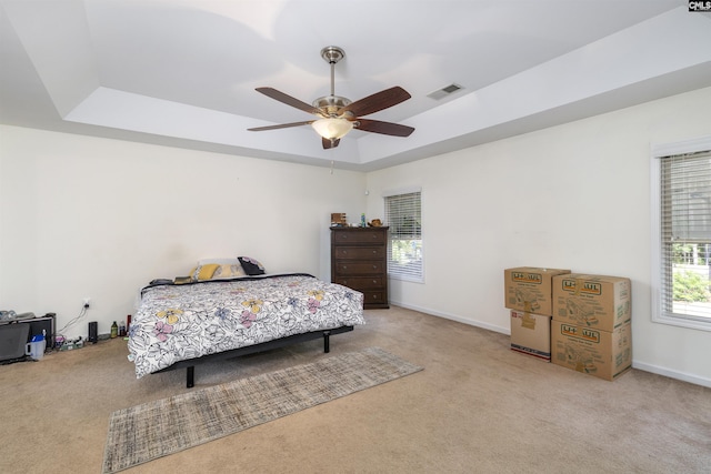 22 Genesis Ln, Camden, SC 29020 - carpeted bedroom with a raised ceiling, a ceiling fan, and baseboards
