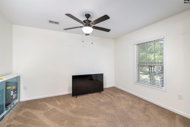 22 Genesis Ln, Camden, SC 29020 - unfurnished living room featuring carpet flooring, baseboards, and ceiling fan