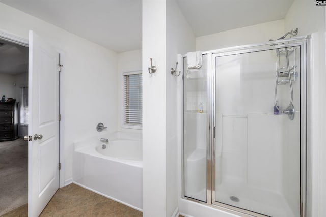 22 Genesis Ln, Camden, SC 29020 - bathroom featuring a shower stall, a garden tub, and tile patterned flooring