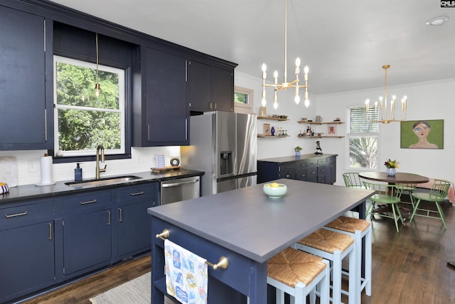 432 Running Fox Rd, Columbia, SC 29223 - kitchen with a sink, a chandelier, appliances with stainless steel finishes, open shelves, and healthy amount of natural light