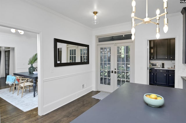 432 Running Fox Rd, Columbia, SC 29223 - dining room with french doors, dark wood finished floors, ornamental molding, and a chandelier