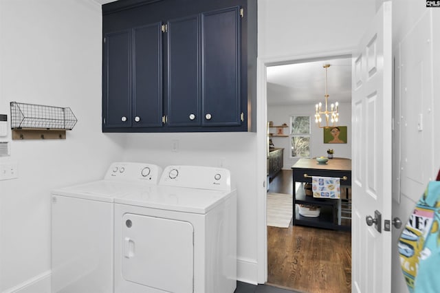 432 Running Fox Rd, Columbia, SC 29223 - laundry area featuring washing machine and clothes dryer, cabinet space, dark wood finished floors, a chandelier, and crown molding