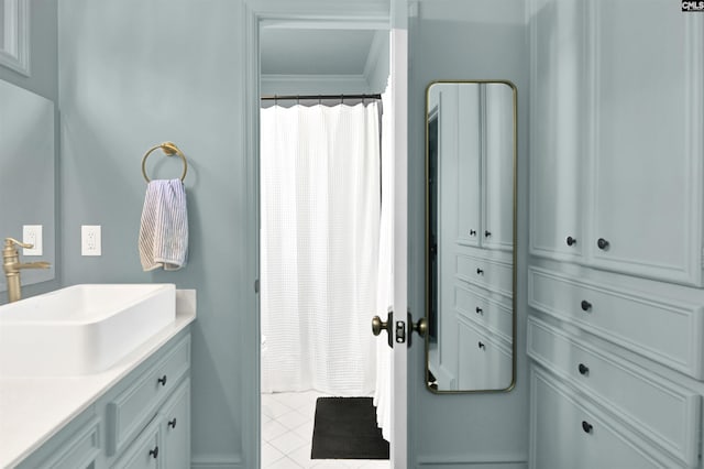 432 Running Fox Rd, Columbia, SC 29223 - bathroom featuring vanity, crown molding, tile patterned floors, baseboards, and curtained shower