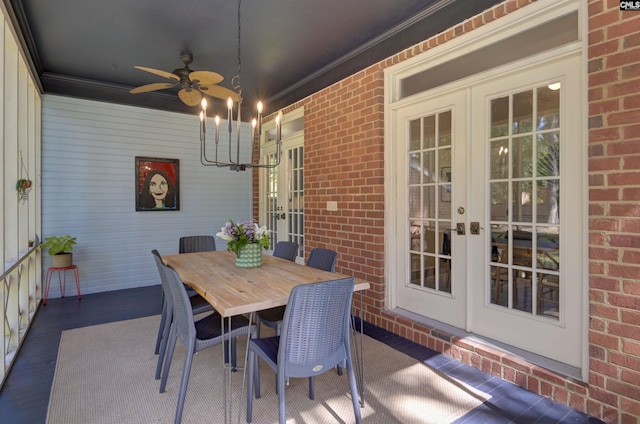 432 Running Fox Rd, Columbia, SC 29223 - dining space featuring french doors, ceiling fan, crown molding, brick wall, and wood finished floors