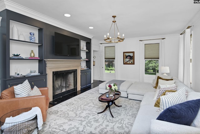 432 Running Fox Rd, Columbia, SC 29223 - living room featuring a chandelier, ornamental molding, a fireplace, built in features, and wood finished floors