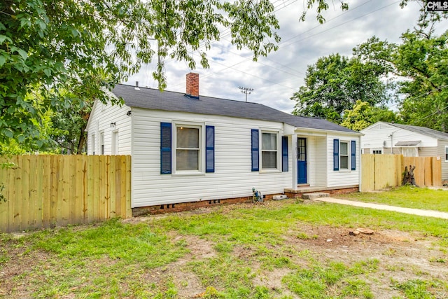1817 English Ave, Columbia, SC 29204 - view of front of house featuring a chimney, crawl space, and a shingled roof