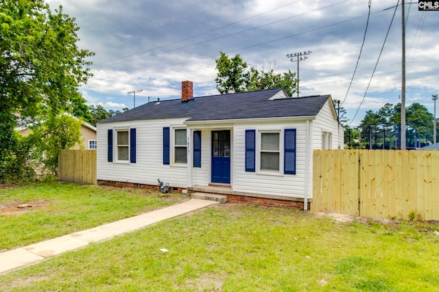 1817 English Ave, Columbia, SC 29204 - view of front of home with a chimney, crawl space, and roof with shingles