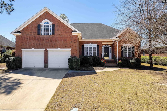 107 Sherborne Ln, Columbia, SC 29229 - traditional home featuring brick siding, a garage, a front yard, driveway, and roof with shingles