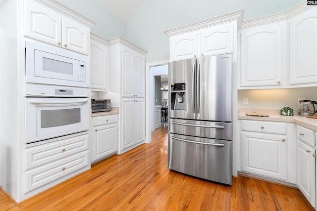 107 Sherborne Ln, Columbia, SC 29229 - kitchen with white appliances, light countertops, light wood-style floors, and white cabinets