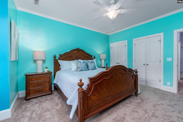 107 Sherborne Ln, Columbia, SC 29229 - bedroom featuring carpet floors, two closets, crown molding, baseboards, and ceiling fan