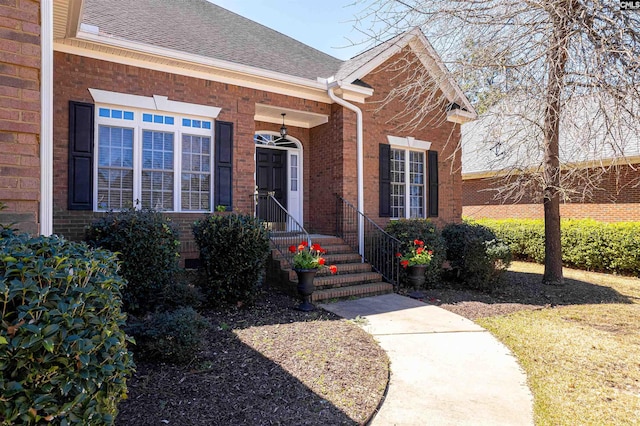 107 Sherborne Ln, Columbia, SC 29229 - view of exterior entry with brick siding and a shingled roof