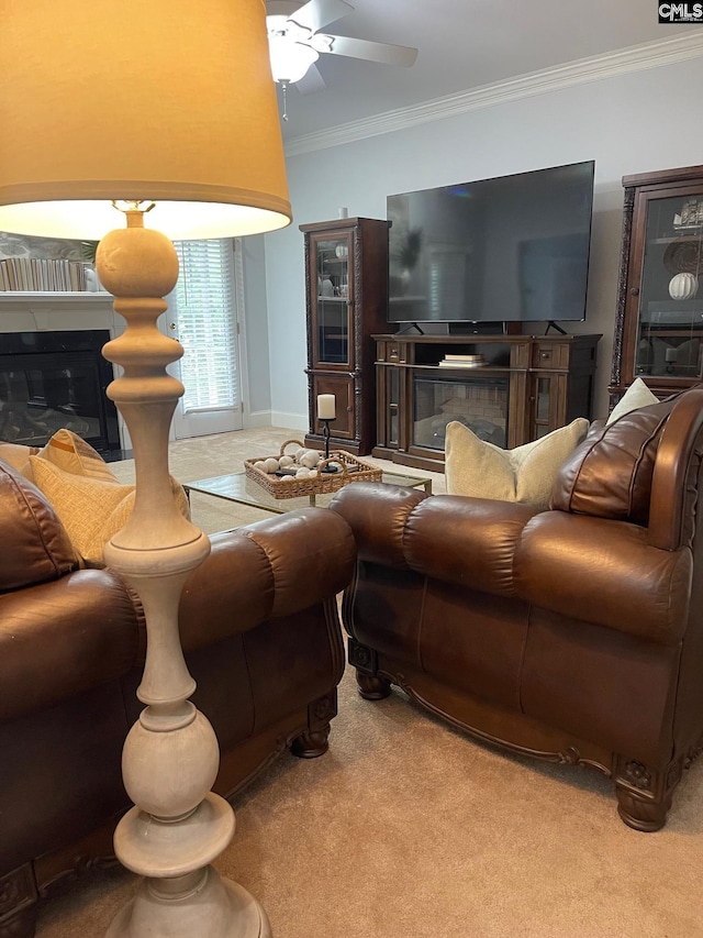 107 Sherborne Ln, Columbia, SC 29229 - carpeted living room featuring a glass covered fireplace, crown molding, and ceiling fan