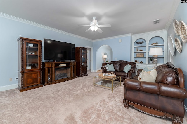 107 Sherborne Ln, Columbia, SC 29229 - living area with arched walkways, a ceiling fan, crown molding, baseboards, and carpet flooring