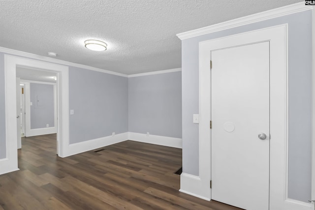 2217 Blossom St, Columbia, SC 29205 - spare room with dark wood-style flooring, baseboards, ornamental molding, a textured ceiling, and a smoke detector