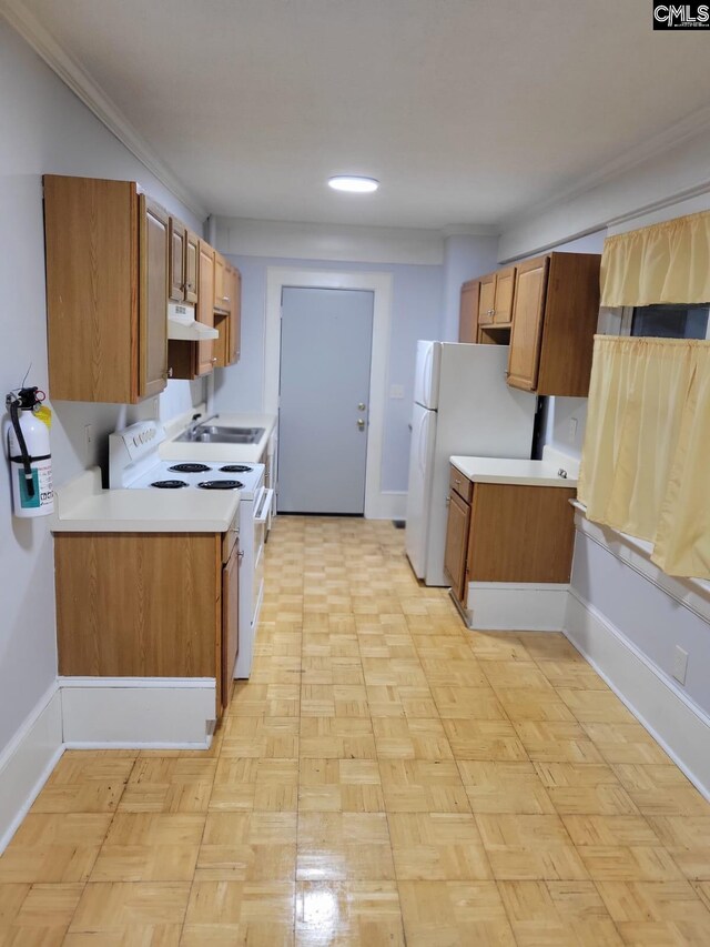 2217 Blossom St, Columbia, SC 29205 - kitchen featuring white appliances, extractor fan, light countertops, brown cabinets, and baseboards