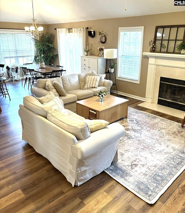 10 Tambridge Ct, Columbia, SC 29229 - living room featuring a chandelier, plenty of natural light, baseboards, and wood finished floors
