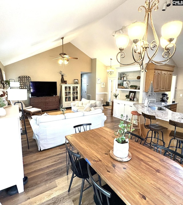 10 Tambridge Ct, Columbia, SC 29229 - dining area with vaulted ceiling, ceiling fan, wood finished floors, and a chandelier