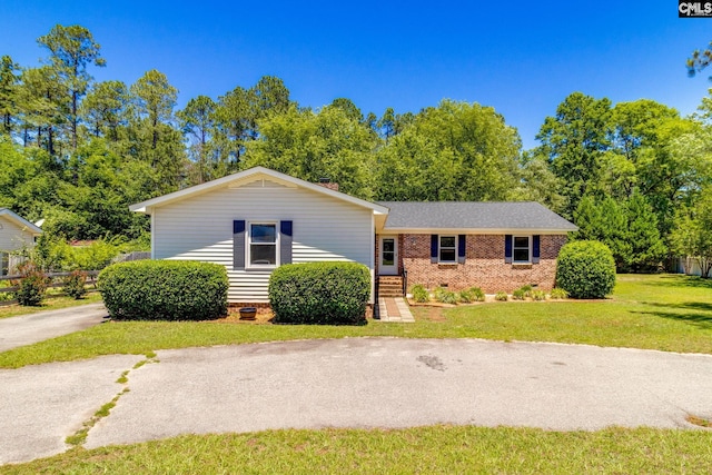 1302 Sunnyhill Dr, Camden, SC 29020 - view of front of home with crawl space, a front lawn, and brick siding