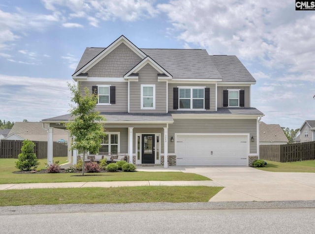 3049 Stallion Rdg, Graniteville, SC 29829 - craftsman-style house featuring covered porch, an attached garage, and driveway