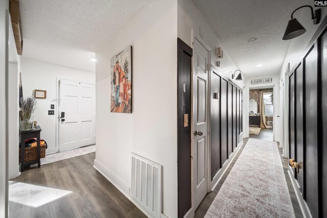 173 Snow Ln, Lexington, SC 29073 - corridor with a textured ceiling, wood finished floors, baseboards, and recessed lighting