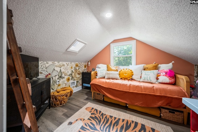 173 Snow Ln, Lexington, SC 29073 - bedroom with baseboards, a textured ceiling, wood finished floors, and lofted ceiling