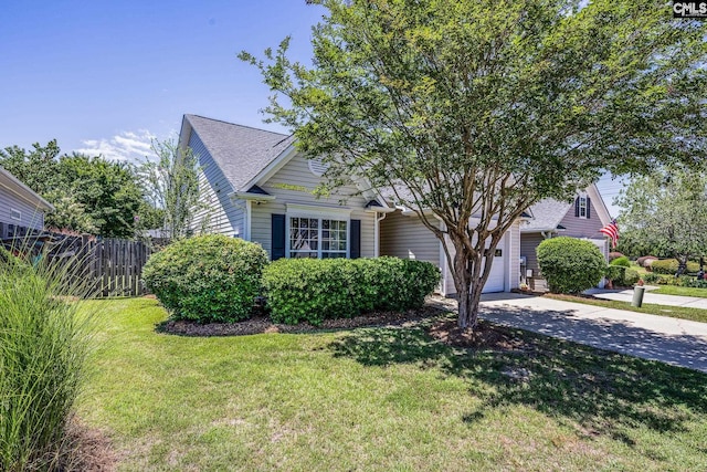 307 Swallowtail Ln, West Columbia, SC 29169 - obstructed view of property featuring concrete driveway and a shingled roof